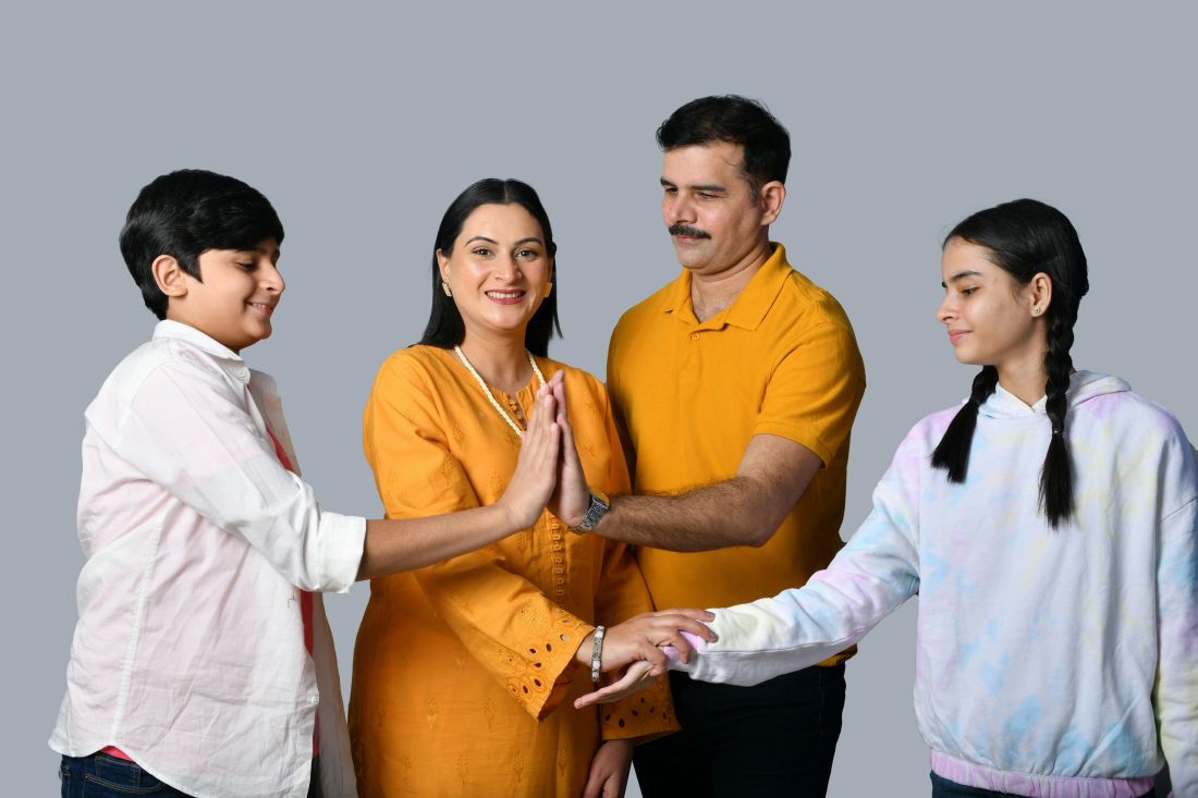 A family of four together.